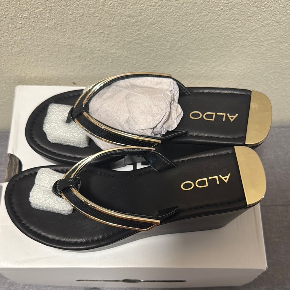 Aldo Black and Gold Wedge Sandals